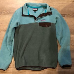 blue and green Patagonia fleece pullover